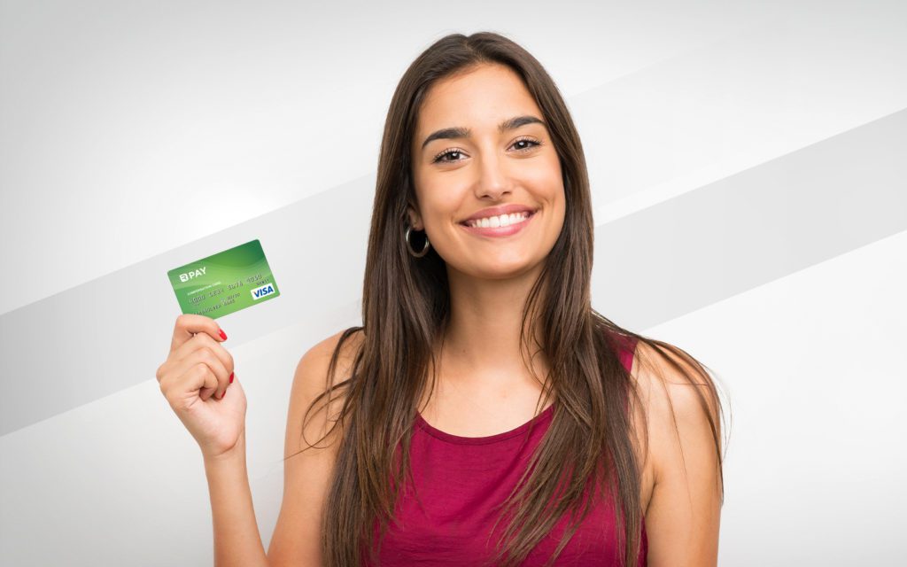 Woman holding up GlobalPAY credit card